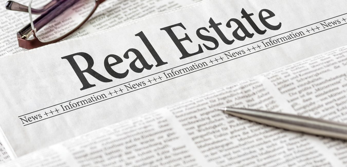 News Paper with Real Estate information
